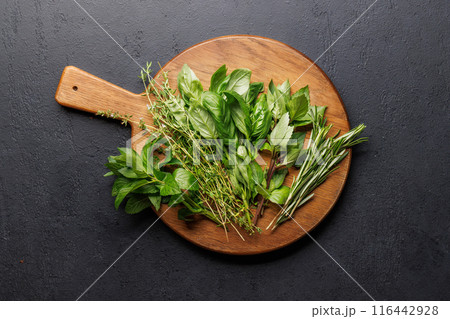 Various herbs on the board 116442928