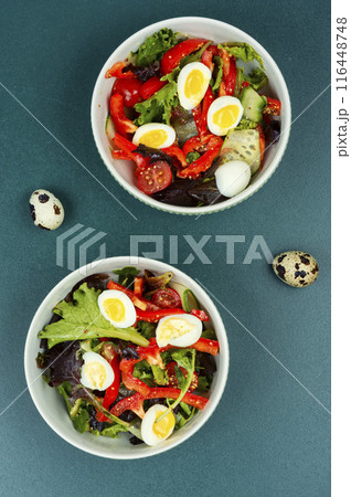 Vegetable salad with quail eggs. Vegetable salad with quail eggs. 116448748