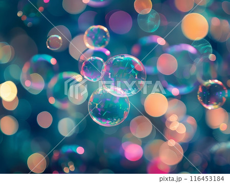 Dreamy glow emanates as colorful bubbles dance in dark blue sky 116453184