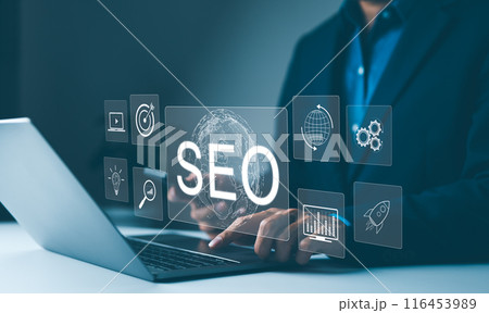 SEO strategy tools and optimization concepts. Marketer working on SEO strategy with laptop and virtual screen showing global SEO optimization icons. attract organic traffic, digital marketing, search, SEO strategy tools and optimization concepts. Marketer working on SEO strategy with laptop and virtual screen showing global SEO optimization icons. attract organic traffic, digital marketing, search, 116453989