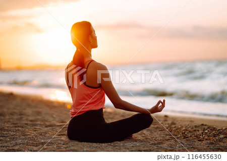 Sport woman doing exercises outdoors. Woman doing stretching. Sport, Active life, sports training. Sport woman doing exercises outdoors. Woman doing stretching. Sport, Active life, sports training. 116455630