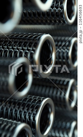 Close-up view Carbon fiber pipes arranged in grid pattern with unique shapes creating visual effect. Pipes have curved, straight sections. Blurred background draws focus to intricate details. Close-up view Carbon fiber pipes arranged in grid pattern with unique shapes creating visual effect. Pipes have curved, straight sections. Blurred background draws focus to intricate details. 116456693