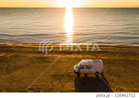 Caravan van on beach. Aerial view 116462712