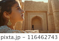 Beautiful woman in traditional Egyptian clothing in an ancient Egyptian temple. 116462743