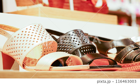 Shelf in shop with summer shoes sandal Shelf in shop with summer shoes sandal 116463003