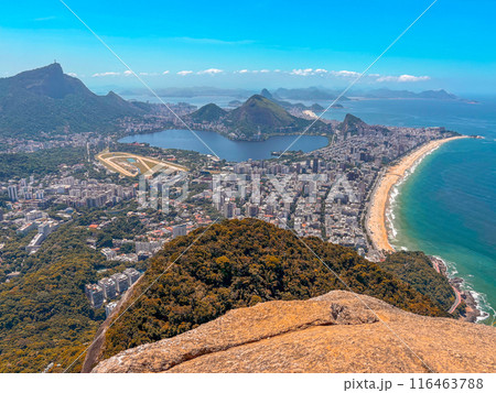 Two brothers hike Rio de Janeiro - man enjoying the view over Copacabana and Ipanema 116463788