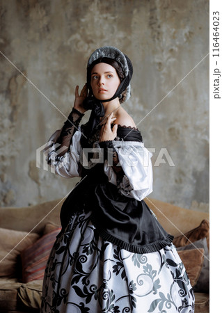 Elegant Baroque Lady in Lavish Lace Gown Elegant Baroque Lady in Lavish Lace Gown 116464023