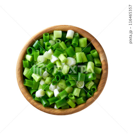 Chopped green onion in a wooden bowl isolated on white background. Top view. Chopped green onion in a wooden bowl isolated on white background. Top view. 116465357