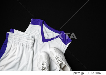 Basketball Outfit and Accessories Laid Out on Dark Background Basketball Outfit and Accessories Laid Out on Dark Background 116470870