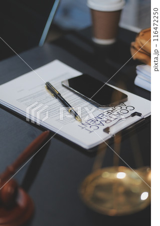 female business woman lawyers working at the law firms. Judge gavel with scales of justice. Legal law, lawyer, documents, advice and justice concept. 116472250
