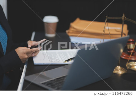 female business woman lawyers working at the law firms. Judge gavel with scales of justice. Legal law, lawyer, documents, advice and justice concept. 116472266