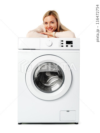 Young Woman Posing with White Washing Machine in a Studio 116472754