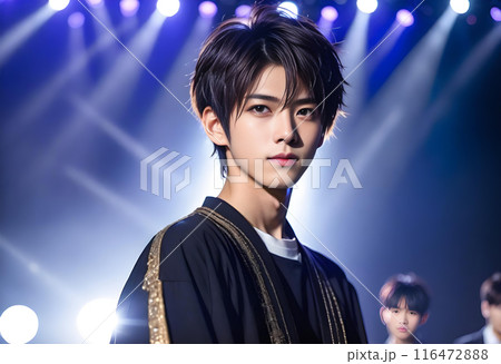 アイドルのようなイケメンでクールな男性のポートレート、スポットライト照明付きのステージ背景　AI生成 116472888