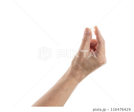 Mid aged female hold transparent pill isolated on white 116476429