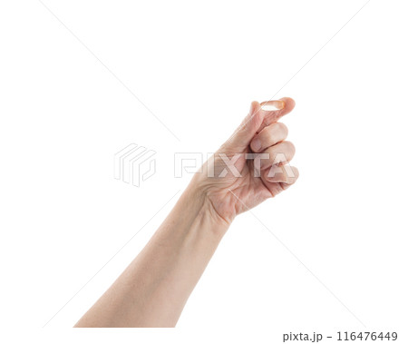 Mid aged female hold transparent pill isolated on white 116476449