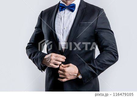 cropped view photo of man wearing tux. man wear tux formal suit. man in tux isolated on white cropped view photo of man wearing tux. man wear tux formal suit. man in tux isolated on white 116479105