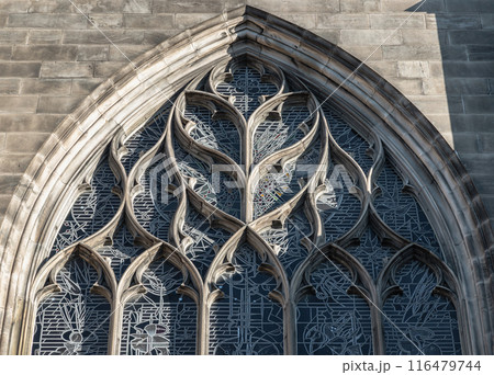 Exterior detail of Large arched window of St Giles' Cathedral or the High Kirk of Edinburgh in gothic style. Exterior detail of Large arched window of St Giles' Cathedral or the High Kirk of Edinburgh in gothic style. 116479744