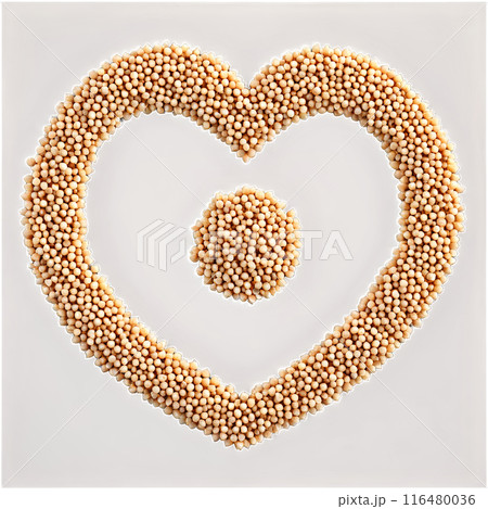 Little millet tiny round light beige seeds tightly packed in a perfect heart outline Food 116480036