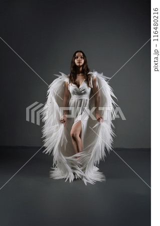 Woman in White Dress With Angel Wings 116480216