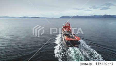 Big boat red Icebreaker in Antarctica polar ocean waters. Excursion boat, people travel to South Pole. Tourism, expeditions and adventures, explore Antarctic Peninsula. Aerial drone pov 116480773