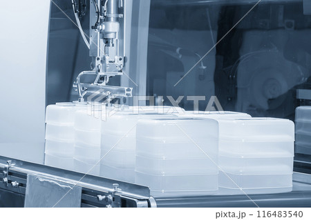 The material handling process by robotic system from injection machine. The material handling process by robotic system from injection machine. 116483540