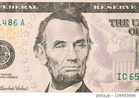US President Abraham Abe Lincoln on USA five dollar bill macro, 5 usd 116483666