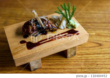 Foie gras sushi on wooden small dish in Japanese restaurant Foie gras sushi on wooden small dish in Japanese restaurant 116484452