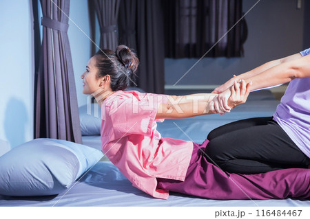 Thai massage by stretching back and hands by hermit posture 116484467