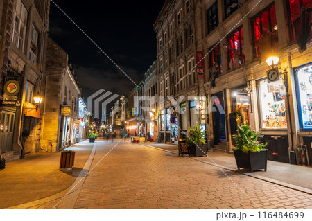 Montreal, Quebec, Canada - October 18 2022 : Rue Saint-Paul ( Saint Paul Street ) in Old Montreal at night. 116484699