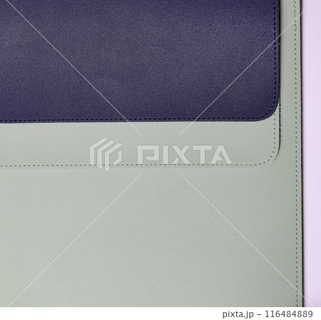close up light green and dark blue artificial leather texture with stitched or seam background. close up light green and dark blue artificial leather texture with stitched or seam background. 116484889