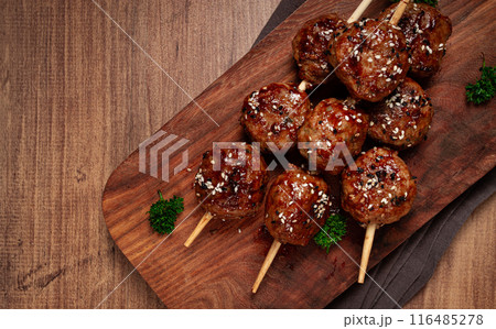 Tsukune, Japanese meatballs, minced chicken, fried on a skewer, with yakitori sauce, homemade, no people, 116485278