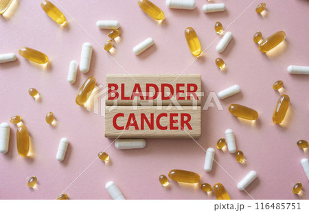 Bladder Cancer symbol. Concept word Bladder Cancer on wooden blocks. Beautiful pink background with pills. Medicine and Bladder Cancer concept. Copy space Bladder Cancer symbol. Concept word Bladder Cancer on wooden blocks. Beautiful pink background with pills. Medicine and Bladder Cancer concept. Copy space 116485751