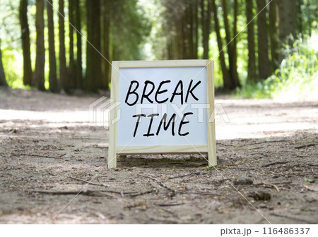 Break Time symbol. Break Time white chalk blackboard. Beautiful forest background. Business and Break Time concept. Copy space. 116486337