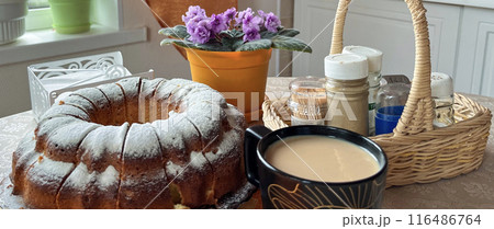 homemade cakes and coffee with milk on the table homemade cakes and coffee with milk on the table 116486764