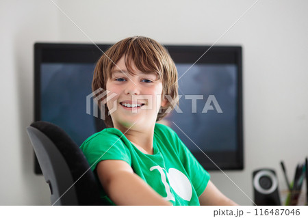 Child in school. Student in class. Boy at homework Child in school. Student in class. Boy at homework 116487046