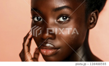 Close-up portrait of African woman with dark skin, highlighting her facial features and skin texture. Beautiful black girl 116488593