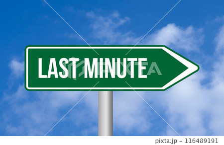Last minute road sign on cloudy sky background 116489191