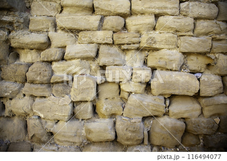 Detail of cladding and decoration on a wall outside Detail of cladding and decoration on a wall outside 116494077