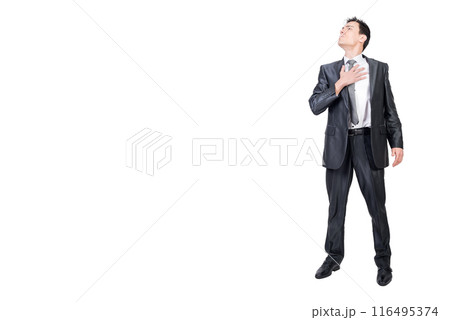 Serious man putting hand on chest and looking away 116495374