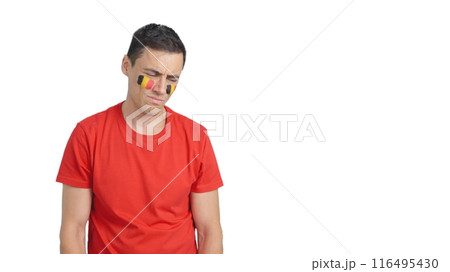 Man cheering for Belgium during a match that is lost Man cheering for Belgium during a match that is lost 116495430