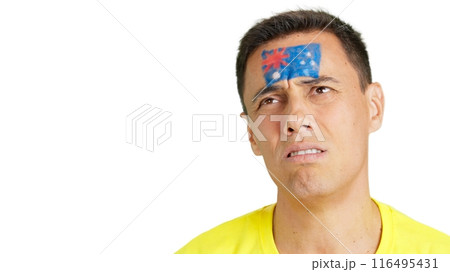 Sad man supporting australian team during a difficult match. Sad man supporting australian team during a difficult match. 116495431