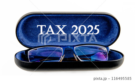 Conceptual tax 2025 symbol. Copy space. Tax 2025 words written symbol on the inside of the glasses case on a white background Conceptual tax 2025 symbol. Copy space. Tax 2025 words written symbol on the inside of the glasses case on a white background 116495585