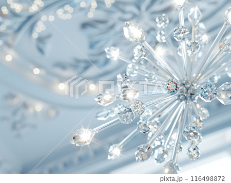 stunning crystal chandelier hangs gracefully from the ceiling, illuminating the room with its sparkling beauty and adding a touch of sophistication to the space. 116498872