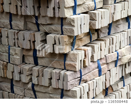 Brick stack tied with ropes for construction and building purposes Brick stack tied with ropes for construction and building purposes 116508448
