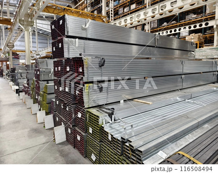 A big warehouse packed with numerous metallic nets and profile A big warehouse packed with numerous metallic nets and profile 116508494
