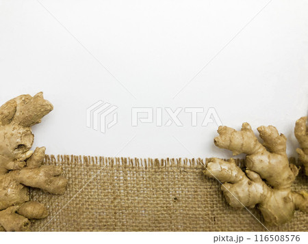 Ginger root isolated on burlap background. Ideal for use in health, culinary and content ,  Ginger root isolated on burlap background. Ideal for use in health, culinary and content ,  116508576