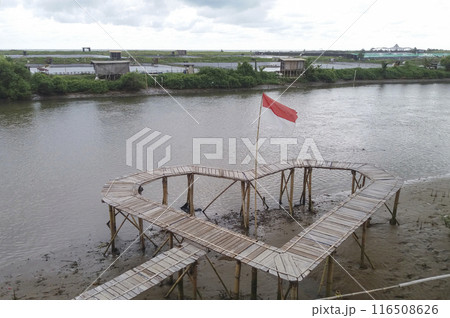 Love bridge and indonesian flag on beach mangrove background 116508626