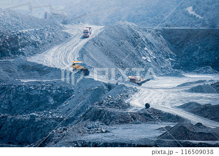 Active diabase quarry with trucks and conveyor belts. Parekklisia, Cyprus 116509038