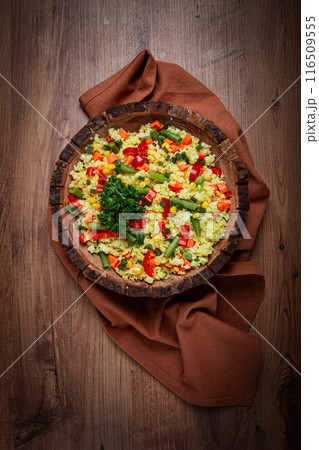 couscous with vegetables, paprika, carrots, string beans, corn, homemade, top view, no people, couscous with vegetables, paprika, carrots, string beans, corn, homemade, top view, no people, 116509555