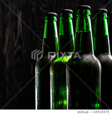 Green beer bottles 116510373